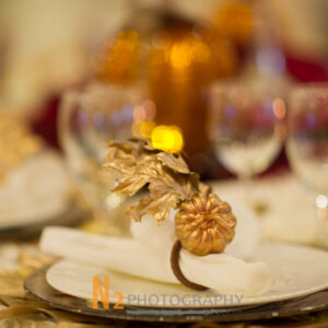 A gold napkin ring at our reception - Alegria Gardens