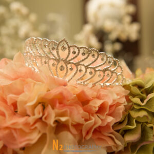 Elegant tiara with pink flowers at our reception hall - Alegria Gardens