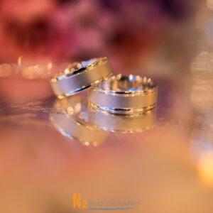 Photograph of two wedding bands at our wedding venue - Alegria Gardens