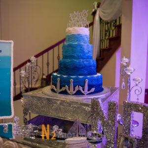 Blue wedding cake with silver at our reception hall - Alegria Gardens