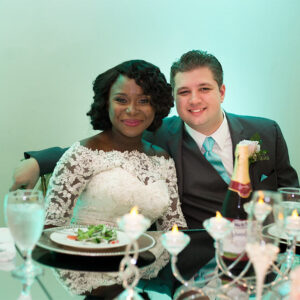 Married couple eating dinner at our reception hall - Alegria Gardens