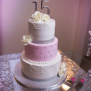 Three tiered cake at our party hall - Alegria Gardens