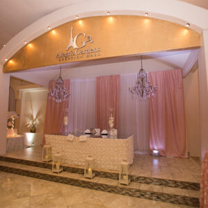 Head table with chandelier at our reception hall - Alegria Gardens