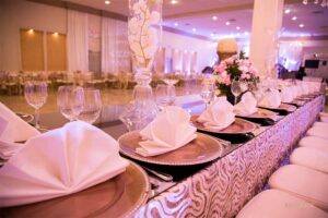 Plates and folded napkins at our wedding venue - Alegria Gardens