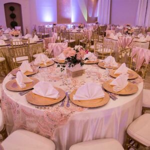 A white decorated table at our wedding venue - Alegria Gardens