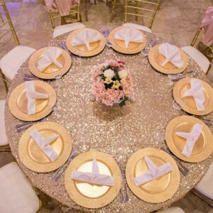 White table with gold plates at our wedding venue - Alegria Gardens