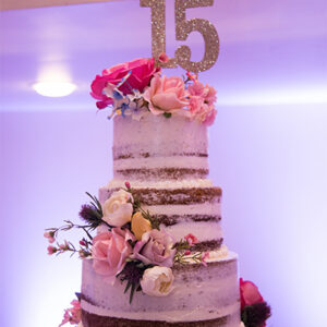 Wedding cake with flowers at our wedding venue - Alegria Gardens