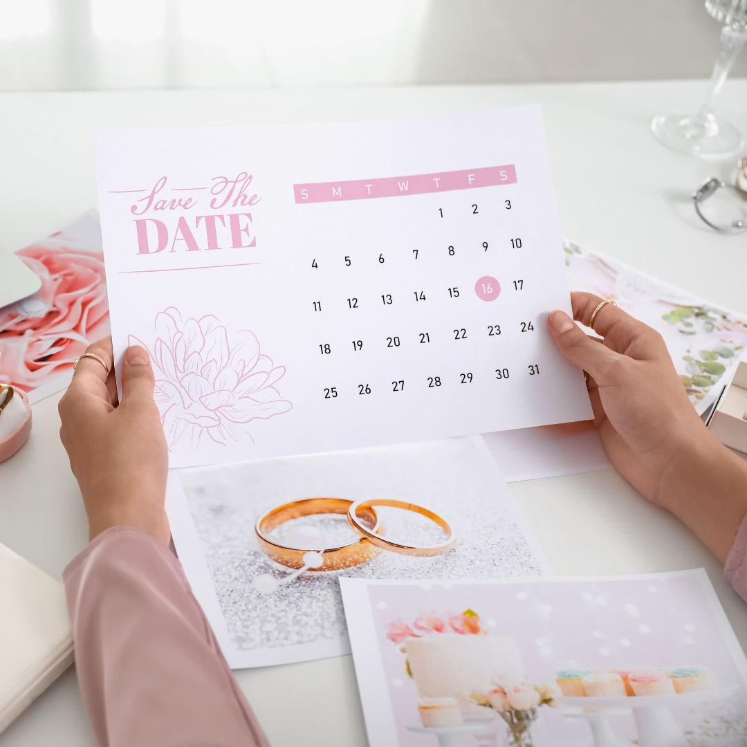 a person looking at a calendar with wedding information