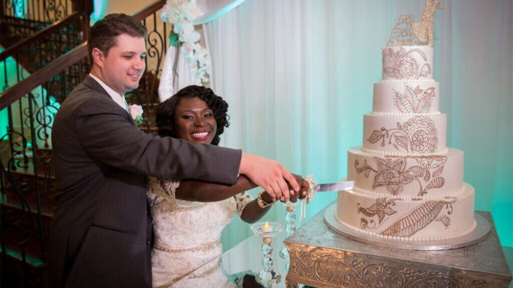 couple cutting cake
