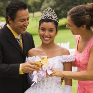 girl and parents at Quinceanera