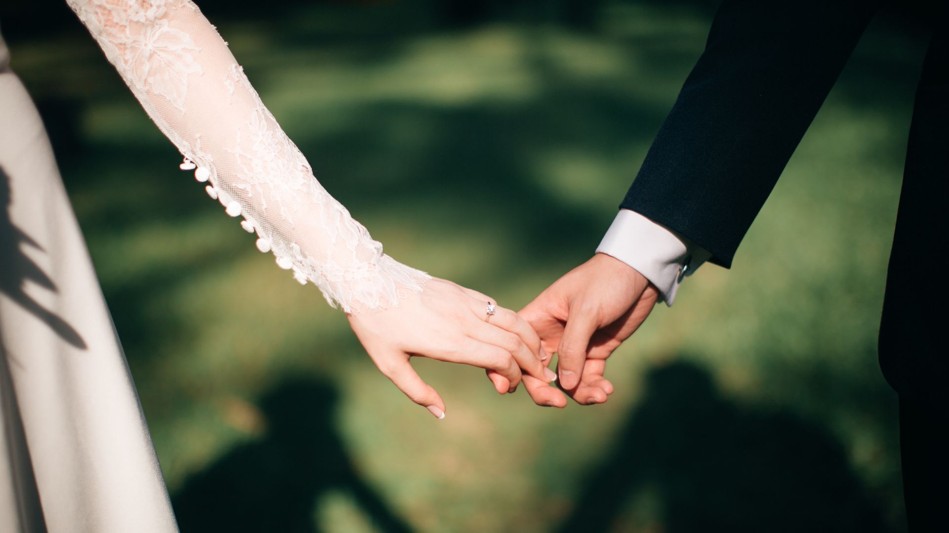 wedding couple holding hands